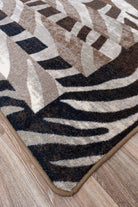 black and brown stripe zebra print rug serged edge. Made in the USA. Free Shipping. Your Western Decor
