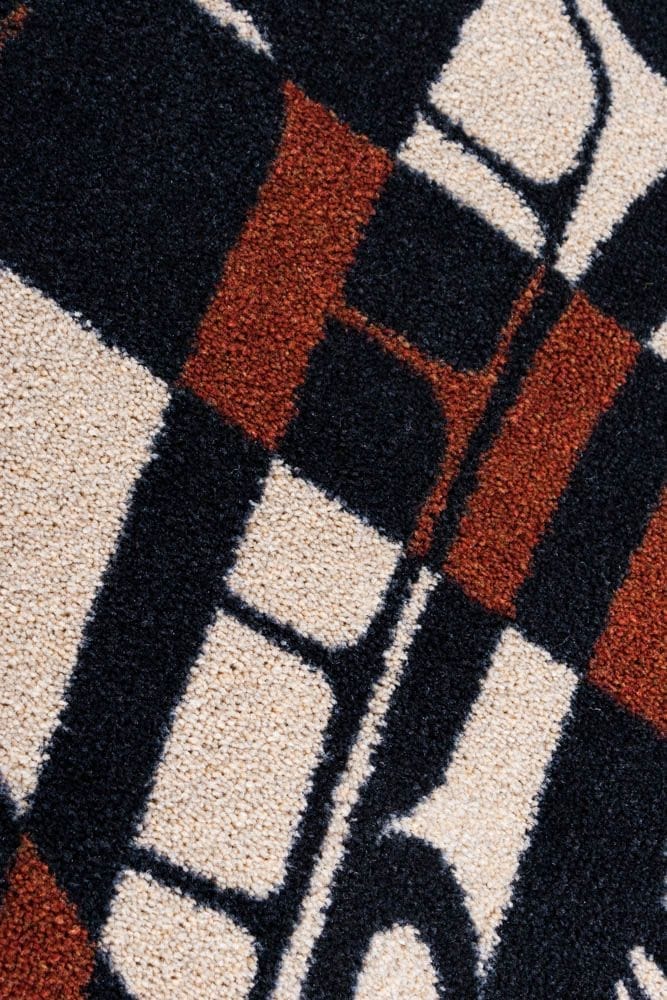 Mike Dangeli - Northern Stripes Round Area Rug - Red & Black carpet detail - Your Western Decor