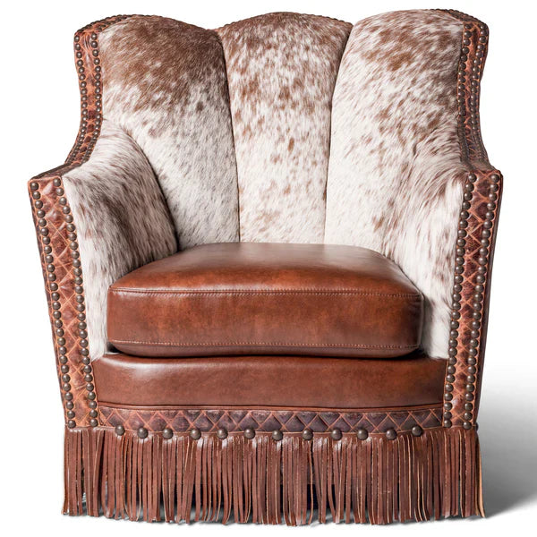 Iron Spur swivel chair with brown peppered cowhide, quilted diamond embossed leather, smooth leather, fringe and nail trim