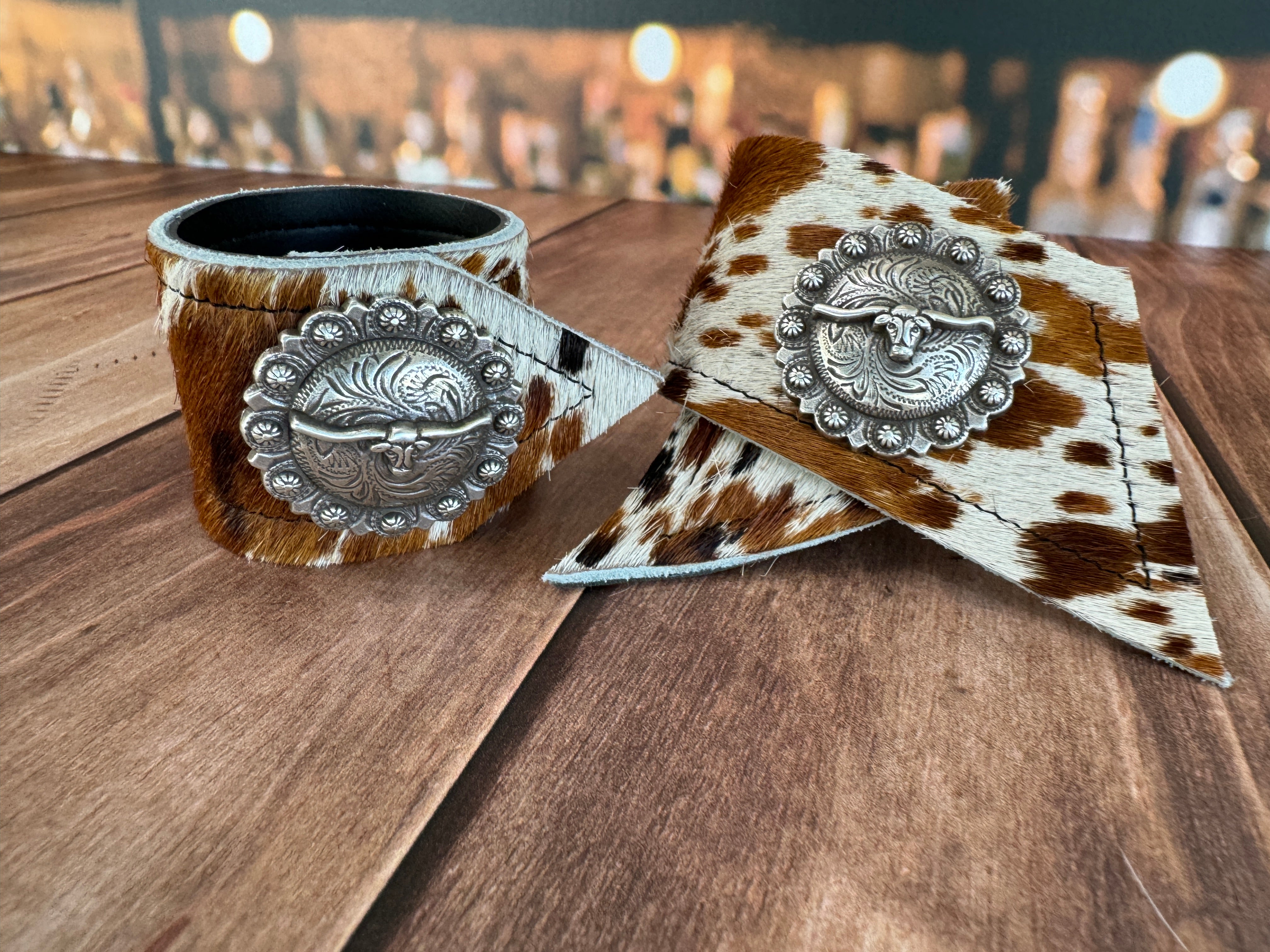 Custom Dyed Cowhide Napkin Rings with metal Longhorn Berry conchos - Handmade in Oregon by Blue Mountain Brands USA