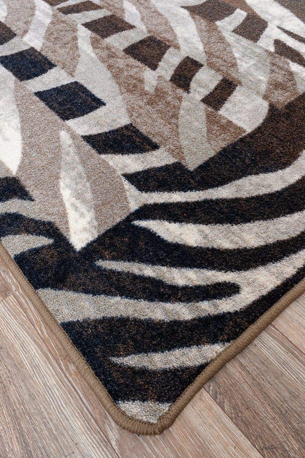 black and brown stripe zebra print rug serged edge. Made in the USA. Free Shipping. Your Western Decor