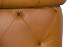 Close-up of a brown leather chair with diamond pattern and button details - Blue Mountain Brands USA