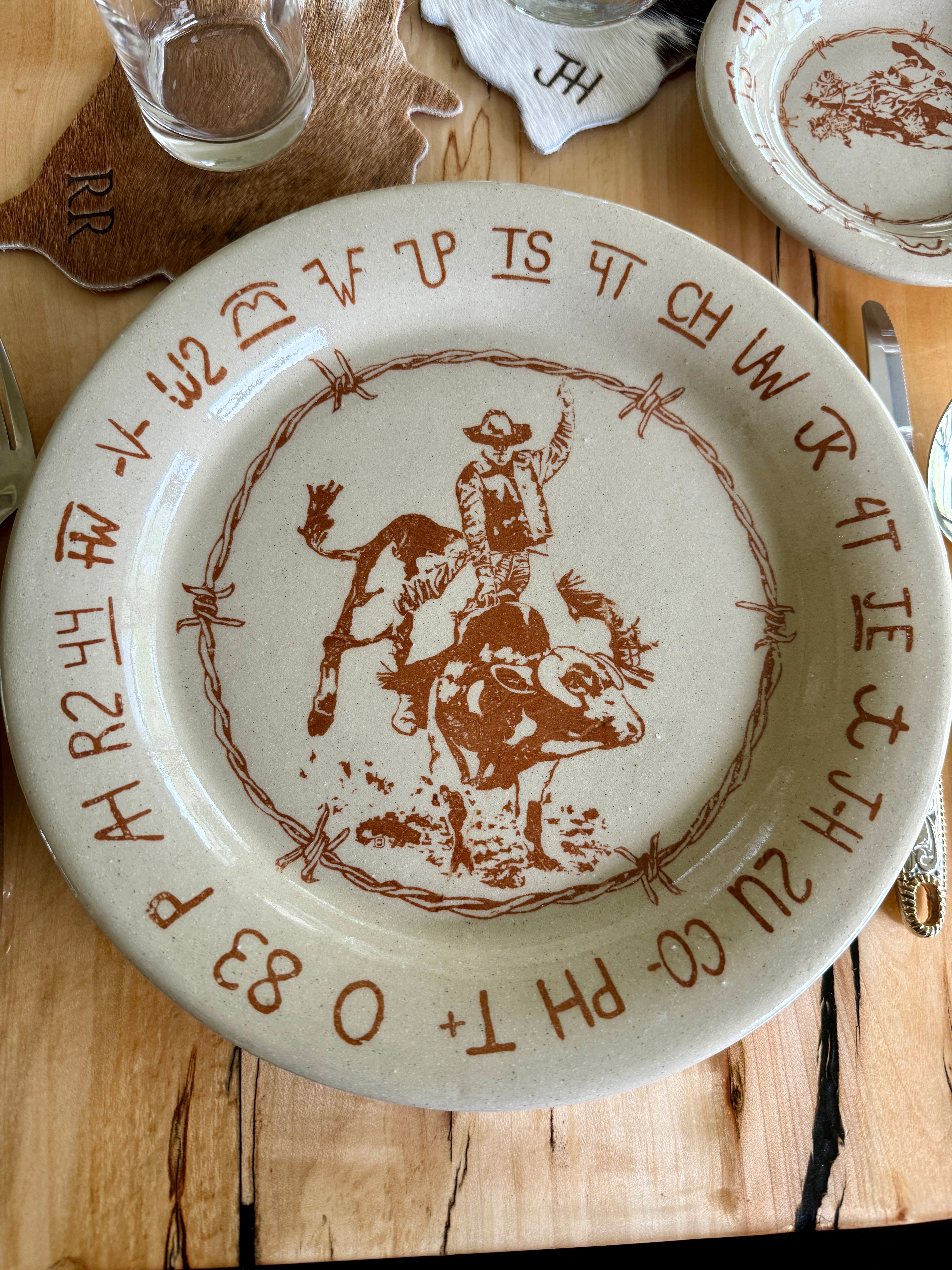 Blue Mountain Brands USA western dinner plate with bull rider, barbed wire and brands - Made in Pendleton, Oregon USA