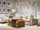 Living room with beige sofa, armchair, Over Under Cocktail Table and Ottoman, and decorative elements with dog pictures on the wall - American made furniture and decor at Blue Mountain Brands USA