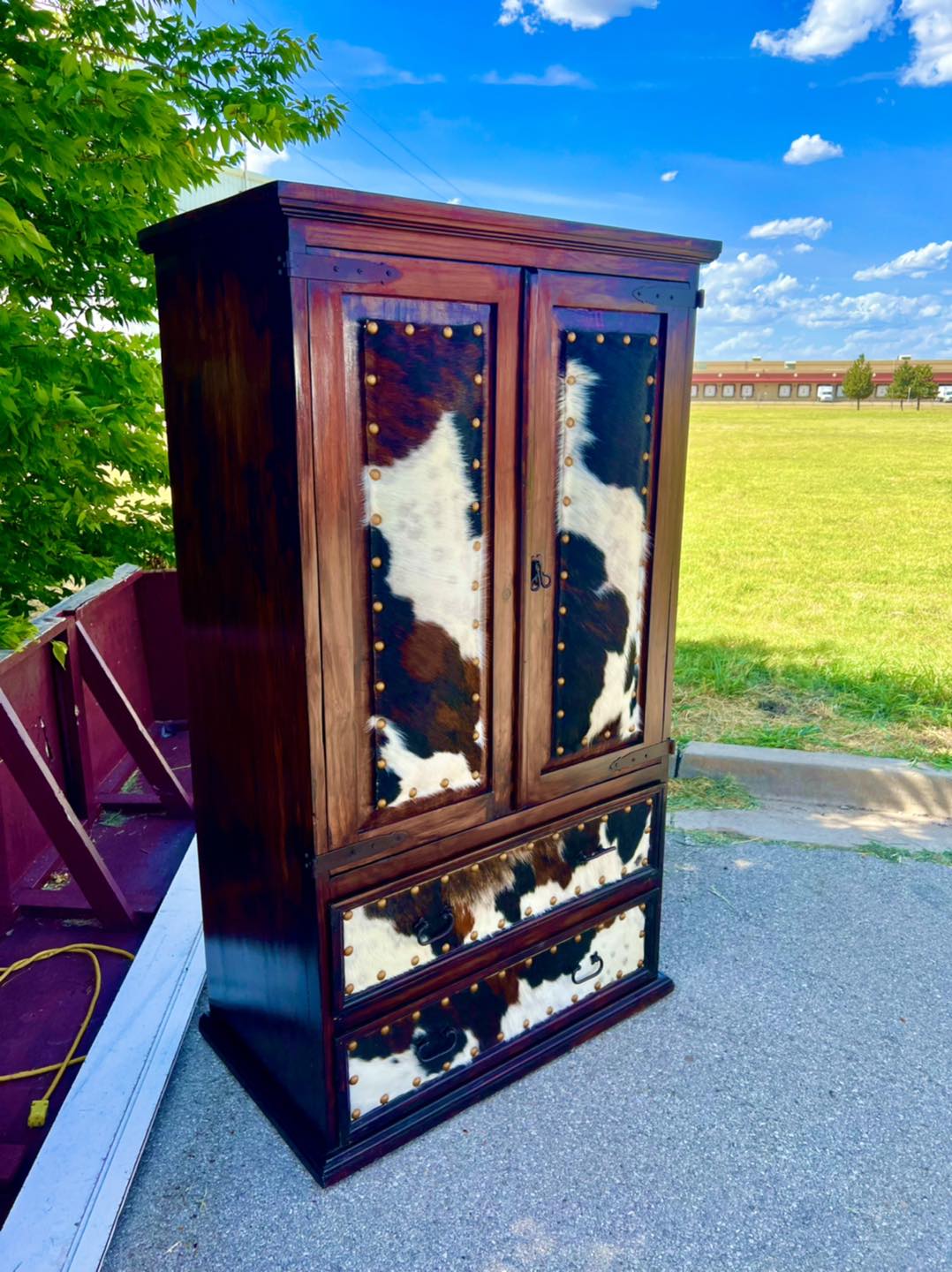 Custom made cowhide upholstered armoire - Blue Mountain Brands USA