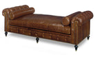 Brown leather daybed lounger, tufted with nail trim and bolster pillows 