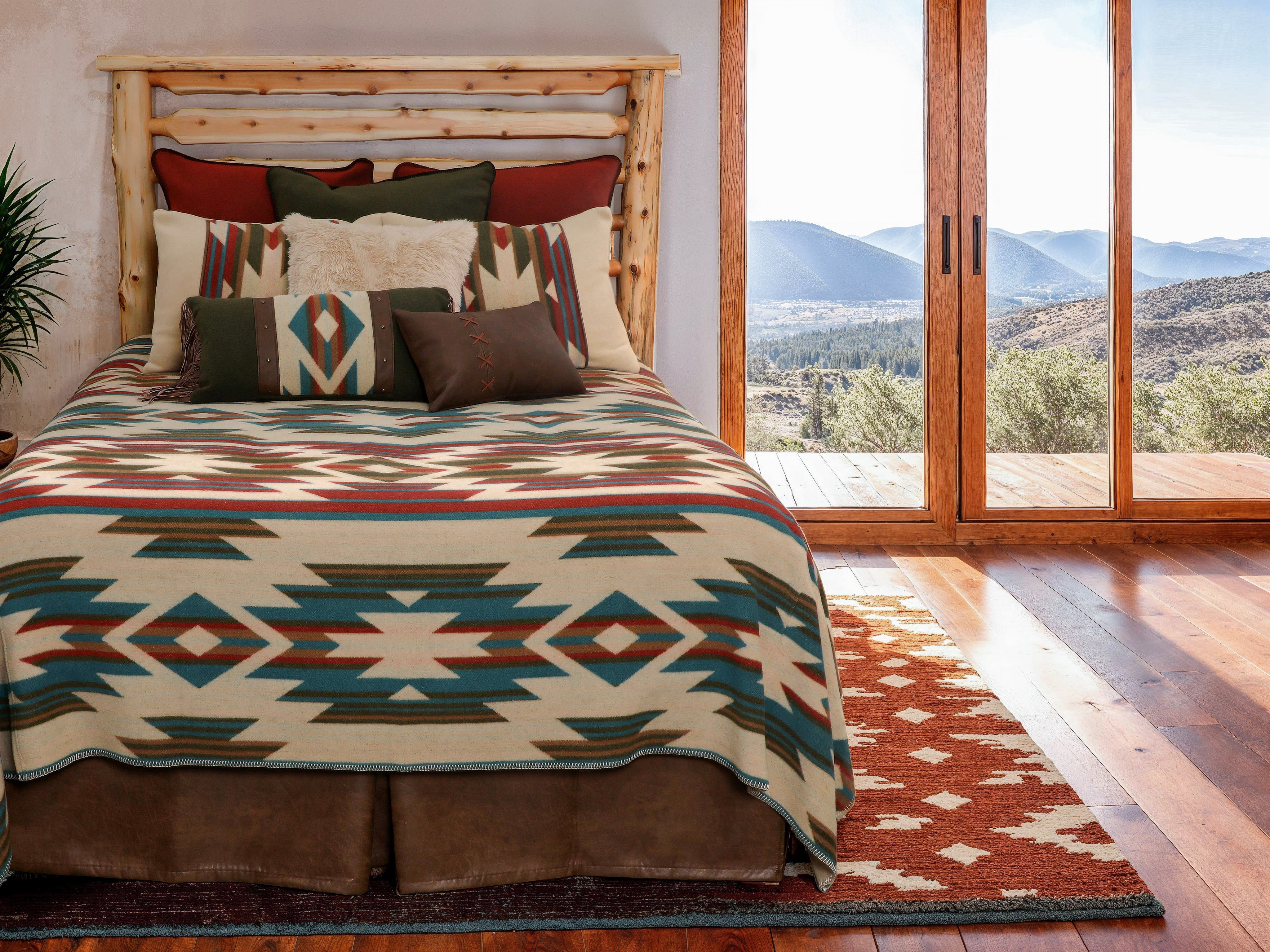 Southwestern bedding with accents in lodge style bedroom 