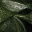 Close up detail of green upholstery leather