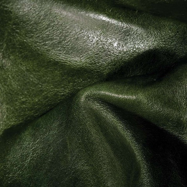 Close up detail of green upholstery leather