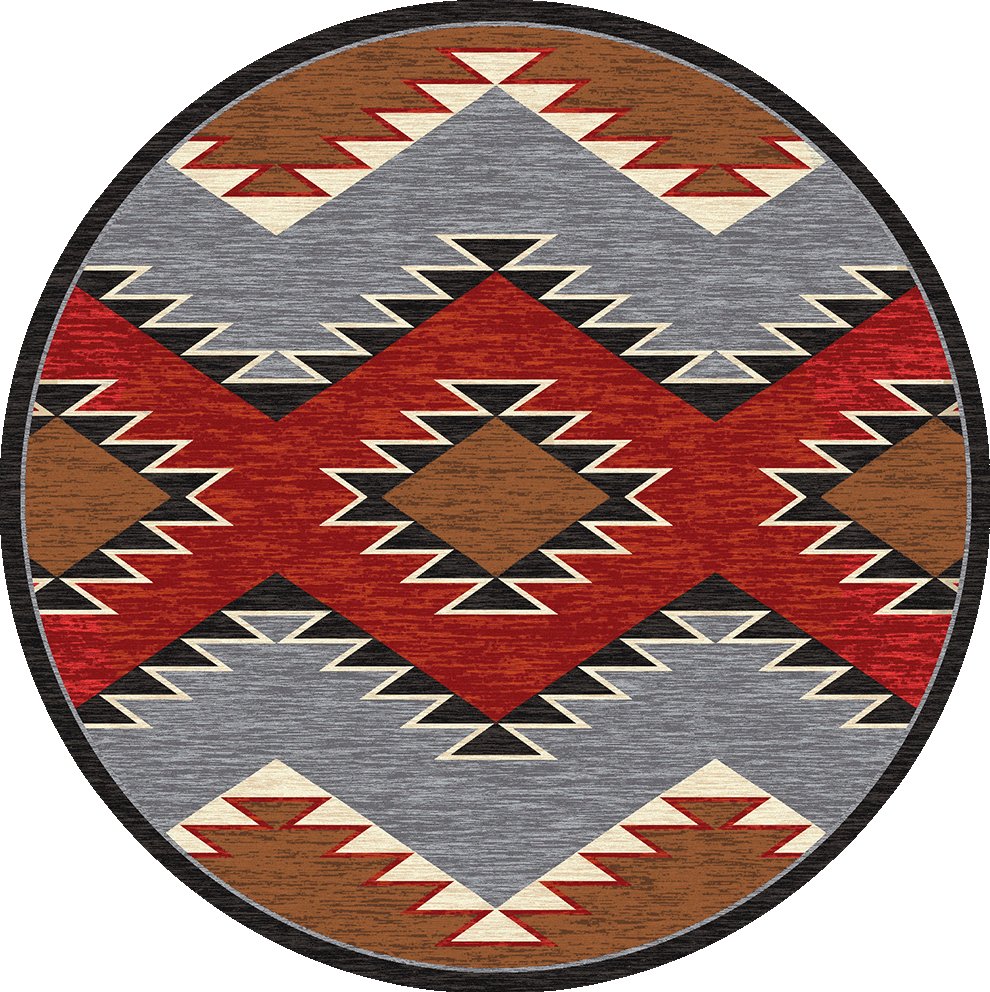 A 8' round area rug with a Southwest design featuring geometric patterns in multiple colors laid on a floor.