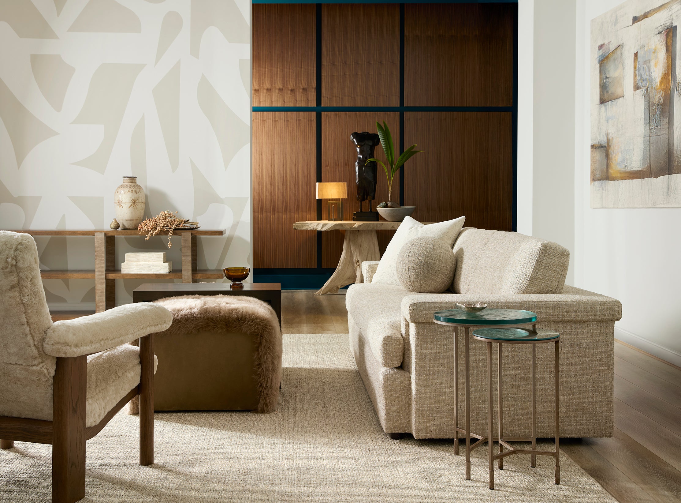Modern living room with beige sofa, armchair, and side tables Blue Mountain Brands USA 