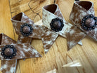 Hand made brown and white peppered cowhide napkin rings with berry conchos - Your Western Decor