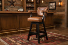 Brown leather bar stool with wooden legs on a white background - Your Western Decor