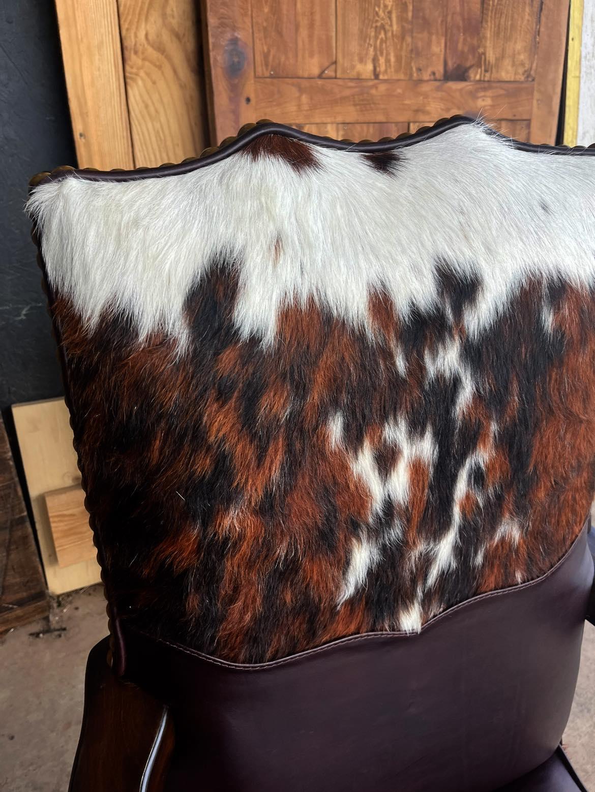 Office chair back detail of tri color cowhide yoke - Blue Mountain Brands USA
