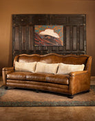Leather sofa and tooled western area rug - Blue Mountain Brands USA Home Furnishings 