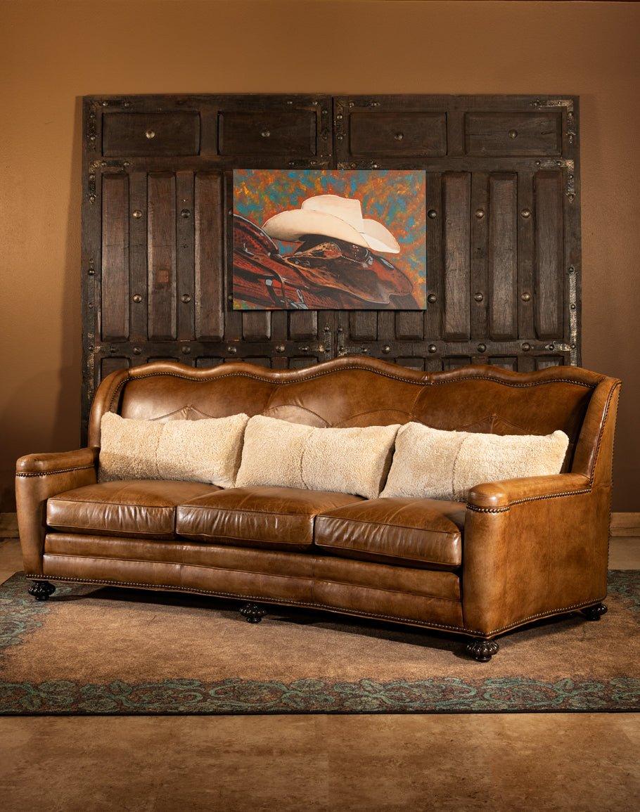 Leather sofa and tooled western area rug - Blue Mountain Brands USA Home Furnishings 