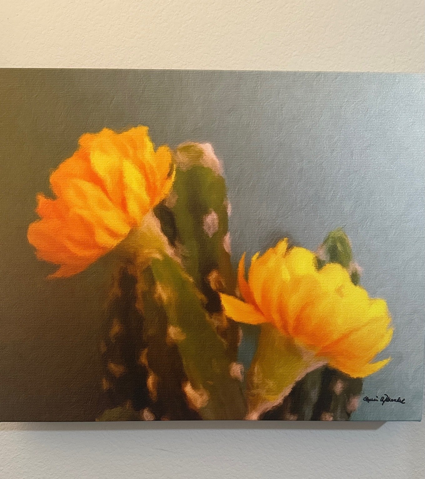 Painting of a cactus with yellow flowers on a textured gray background - Art by Sherri Alexander for Blue Mountain Brands USA