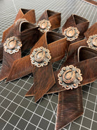 Brindle cowhide and horseshoe concho napkin rings handmade in the USA by Blue Mountain Brands USA Home Decor